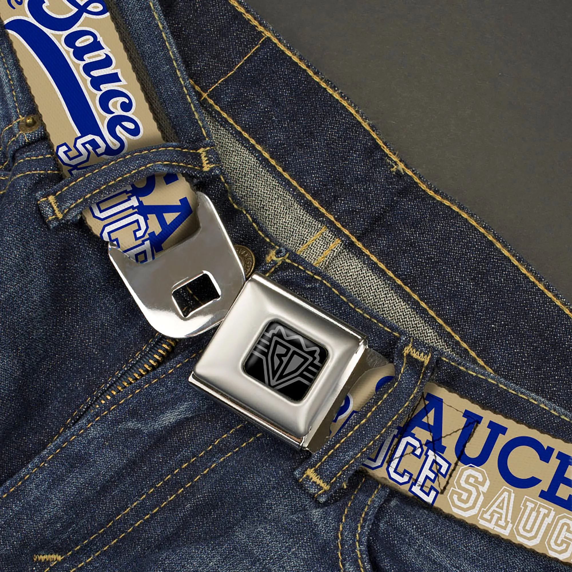 BD Wings Logo CLOSE-UP Black/Silver Seatbelt Belt - SAUCE Typography Collage Tan/White/Blue Webbing